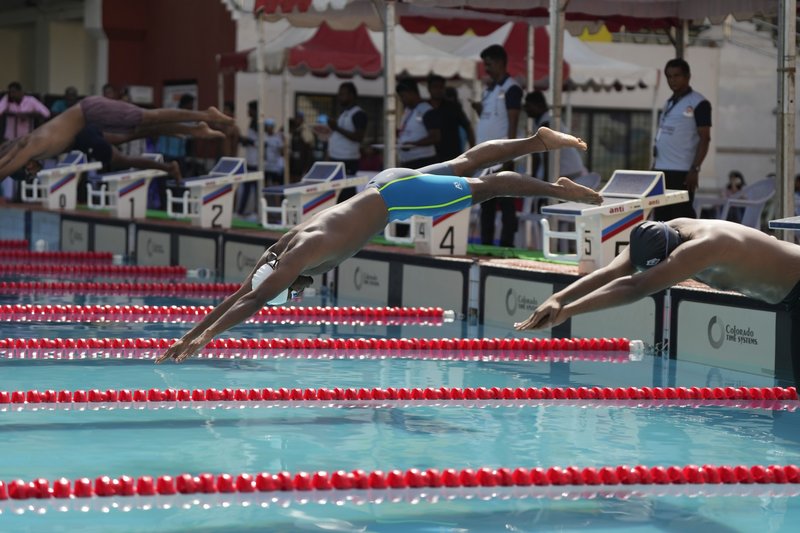 Action from the College Swimming competition at the CM Trophy State Games on Tuesday 1 (1)