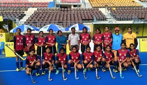 Coimbatore Girls Hockey team during the CM Trophy with coaches S Yoganand and T.P. Anitha.